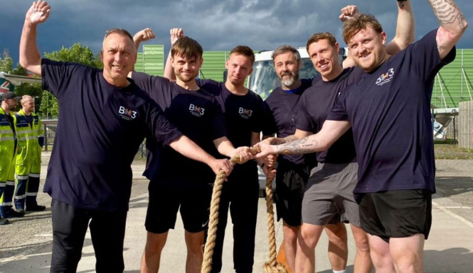 The team celebrating after the BW3 charity fire engine pull